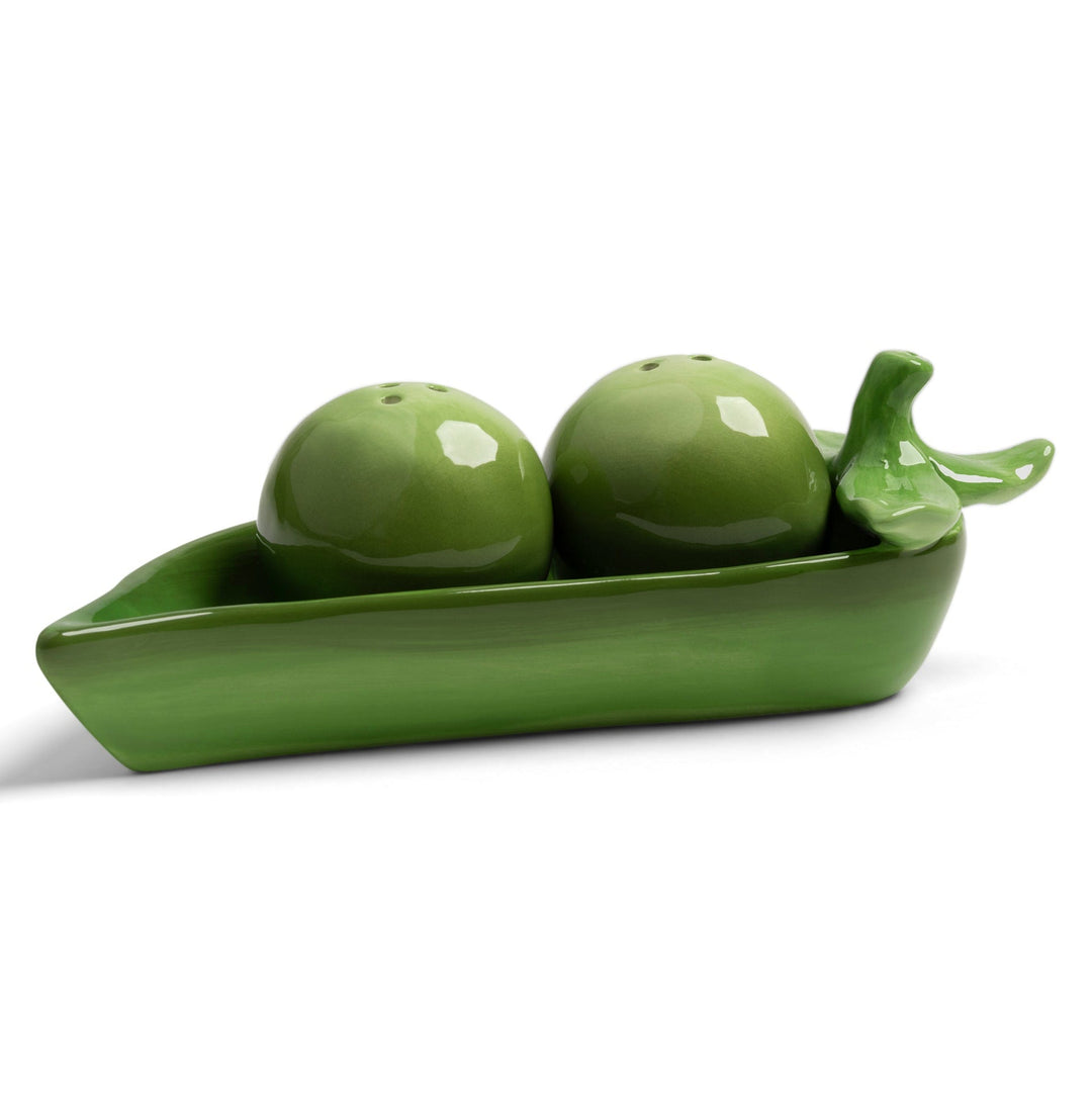 Green ceramic pea salt and pepper shaker set by &klevering, with decorative pea pod holder.
