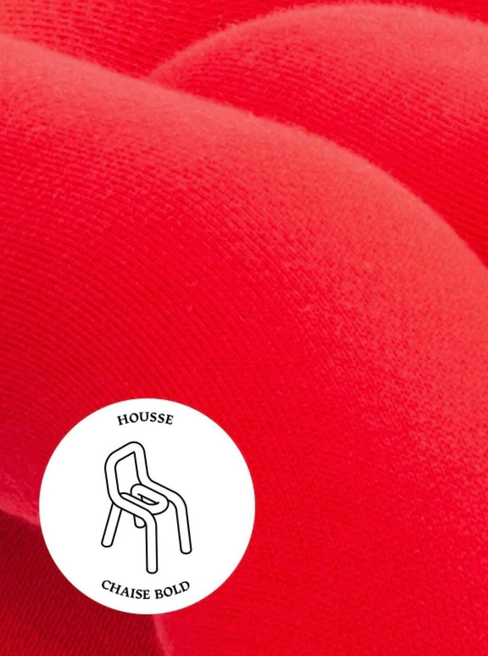 Red chair cover from Moustache Paris with a smooth, solid color fabric texture.