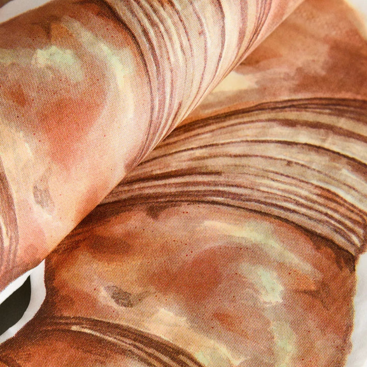 Croissant paper napkins (set of 20) with brown stripes and orange hues.