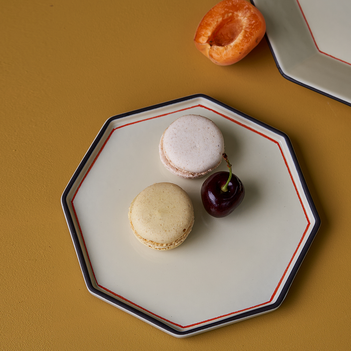 Gem side dish in ivory by Black blaze with macarons and a cherry from Shop Dessein Parke
