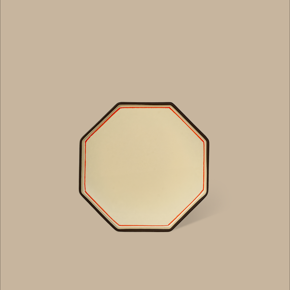 Ivory gem side plate with red trim by Black Blaze featuring an octagonal shape.