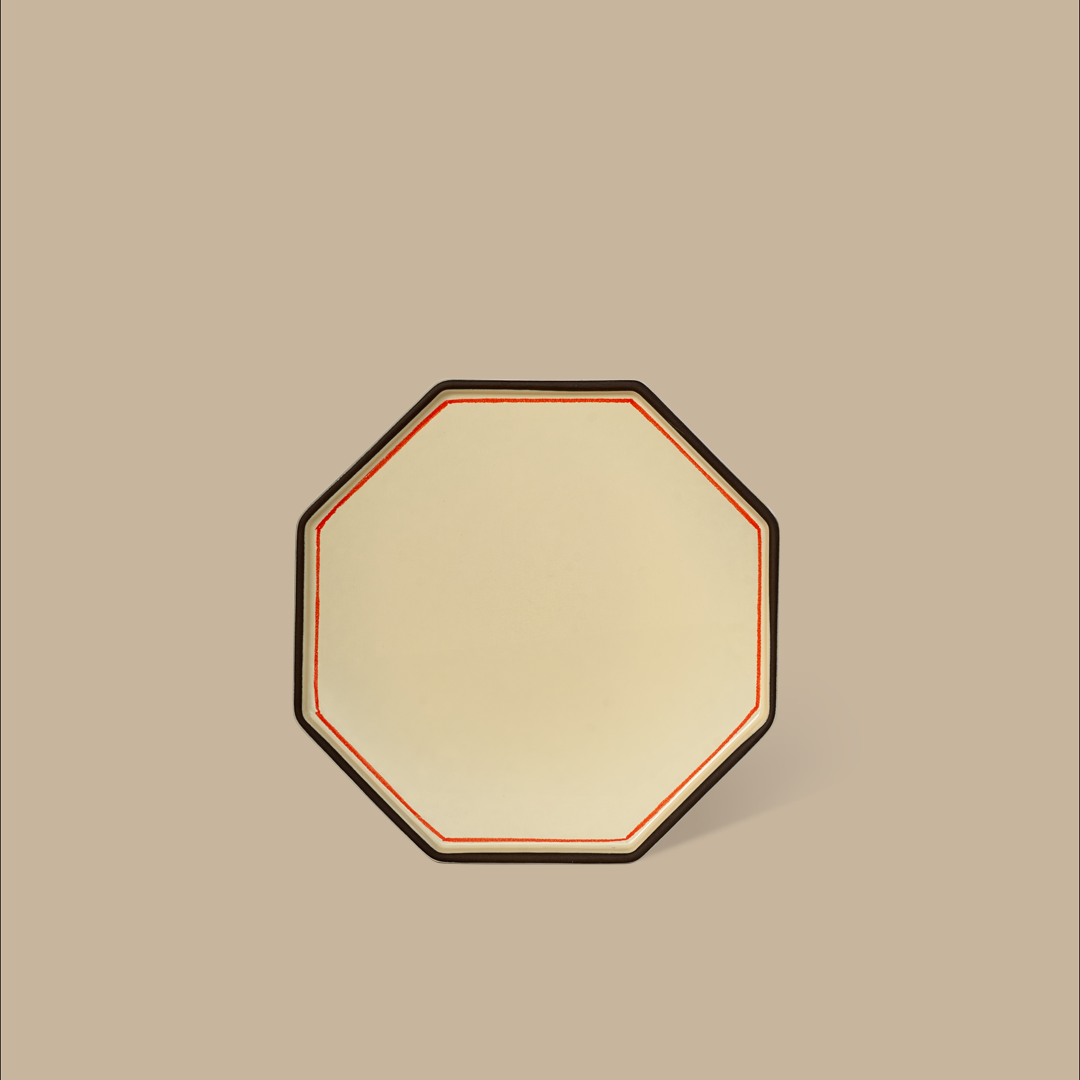 Ivory gem side plate with red trim by Black Blaze featuring an octagonal shape.