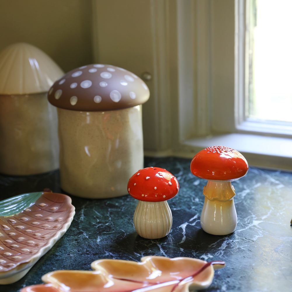 Ceramic mushroom salt and pepper set by &klevering, with white spots and a shiny finish.