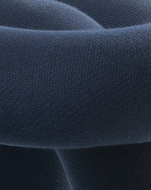 Purple stool from Moustache, featuring a smooth, curved texture.