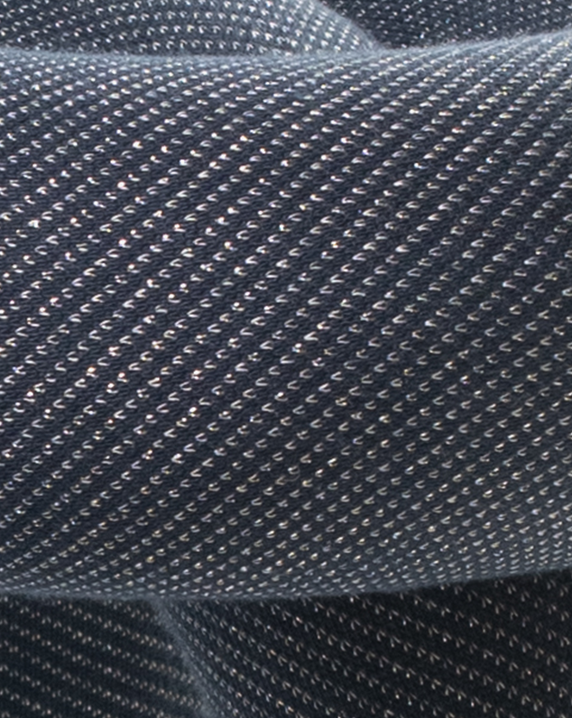 Purple knit stool from Moustache with shimmering silver stitches.