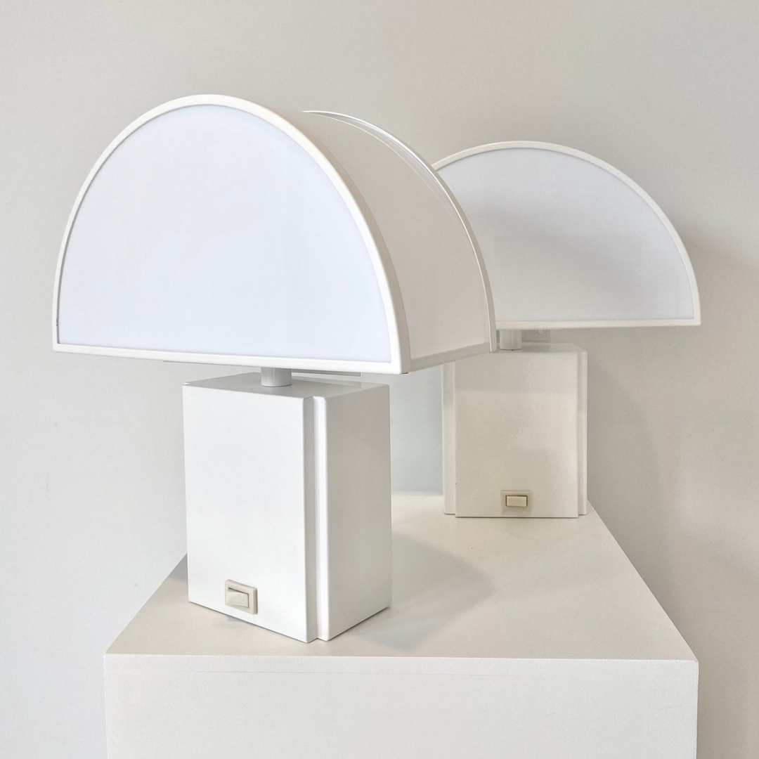 White vintage table lamp by Harvey Guzzini, with a rectangular base and semi-circular lampshade.