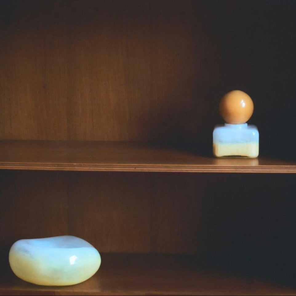 Nanushka painted glass bottle Decorative bottle with a yellow base and orange top