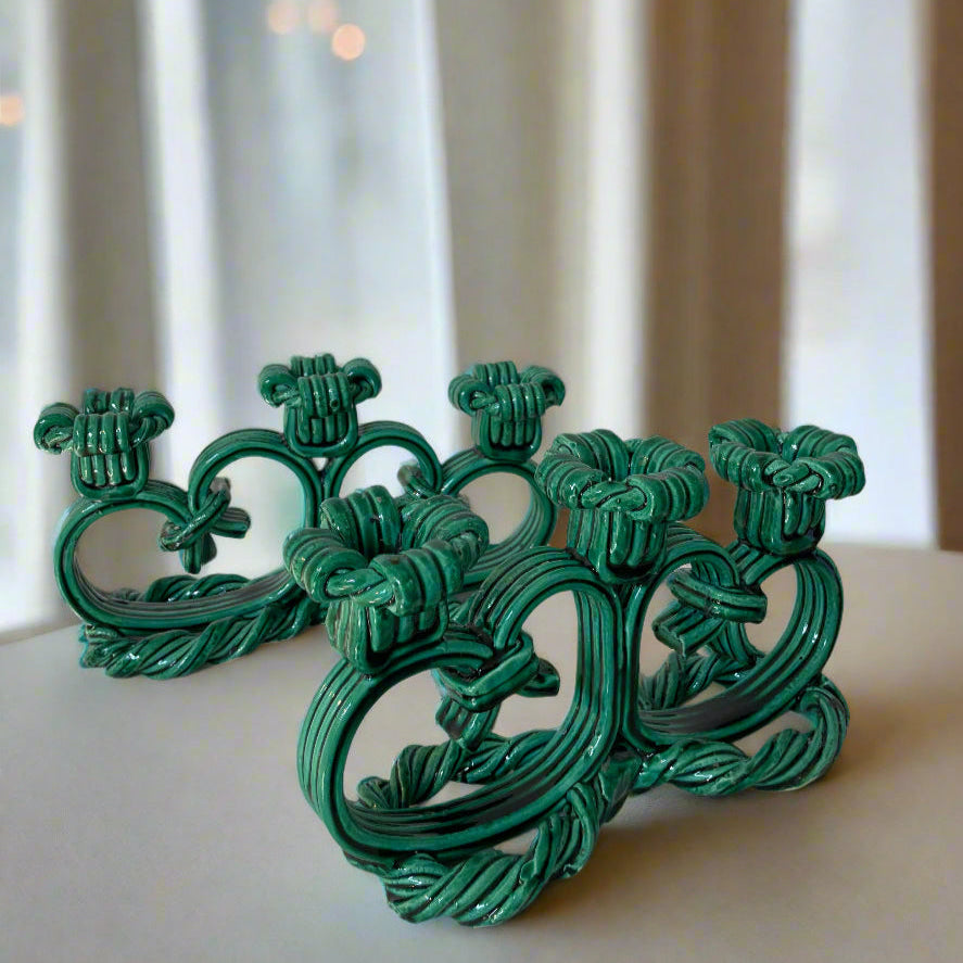Green ceramic candelabra from Vallauris, France, featuring an intertwined rope design.