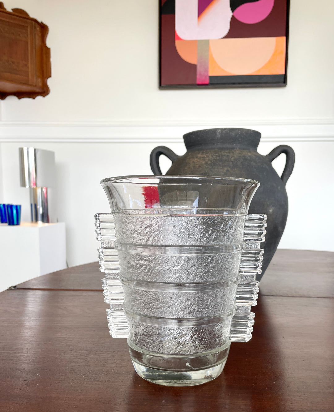 Clear crystal vase by Daum Freres with an Art Deco design and textured details.