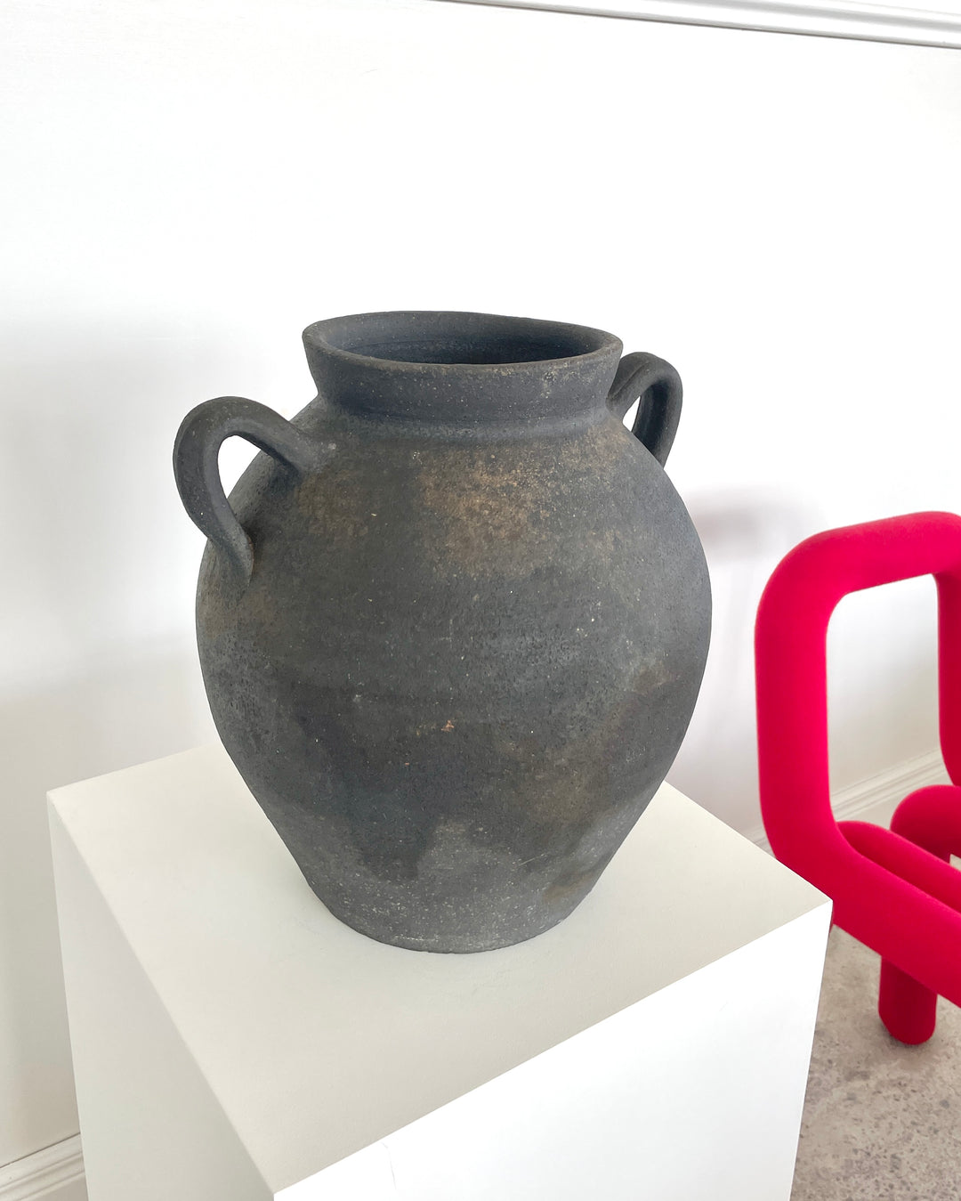 Antique black pottery from Catalunya, Spain.  Originally made to transport cold water these jugs are now considered cultural treasures and used as decorative objects to add personality and character to interiors. Great patina with soft green undertones.