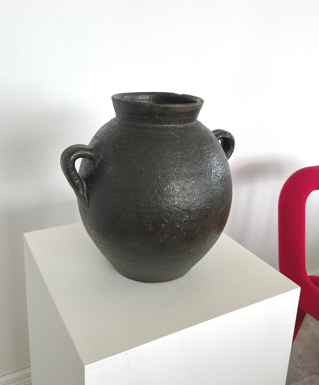 Antique black pottery from Catalunya, Spain.  Originally made to transport cold water these jugs are now considered cultural treasures and used as decorative objects to add personality and character to interiors. Great patina with soft green undertones.