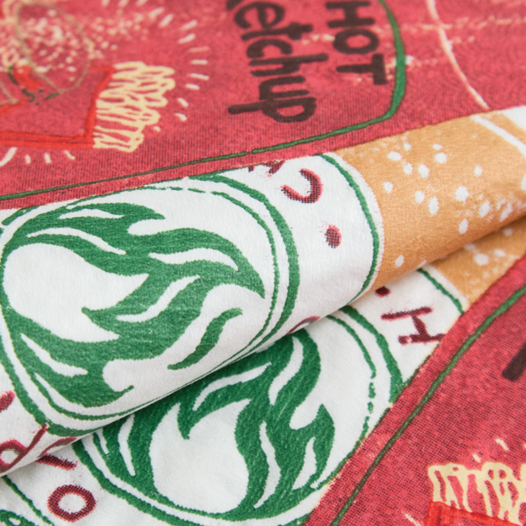 Decorative paper napkins featuring a ketchup and mustard pattern, pack of twenty.