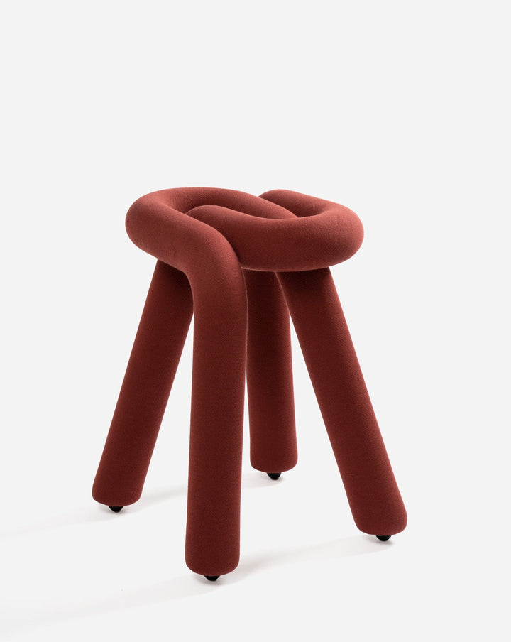 Purple fabric stool by Moustache with a knotted design and round legs.