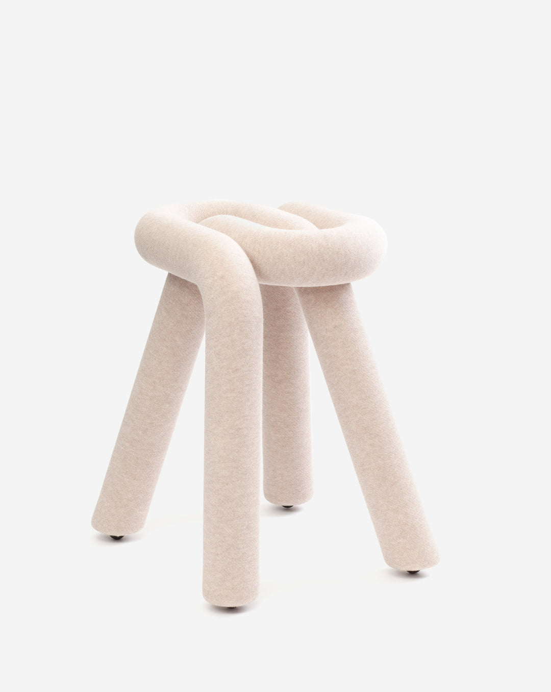 Upholstered stool with knot detail by Moustache, featuring three tubular legs and neutral beige fabric.
