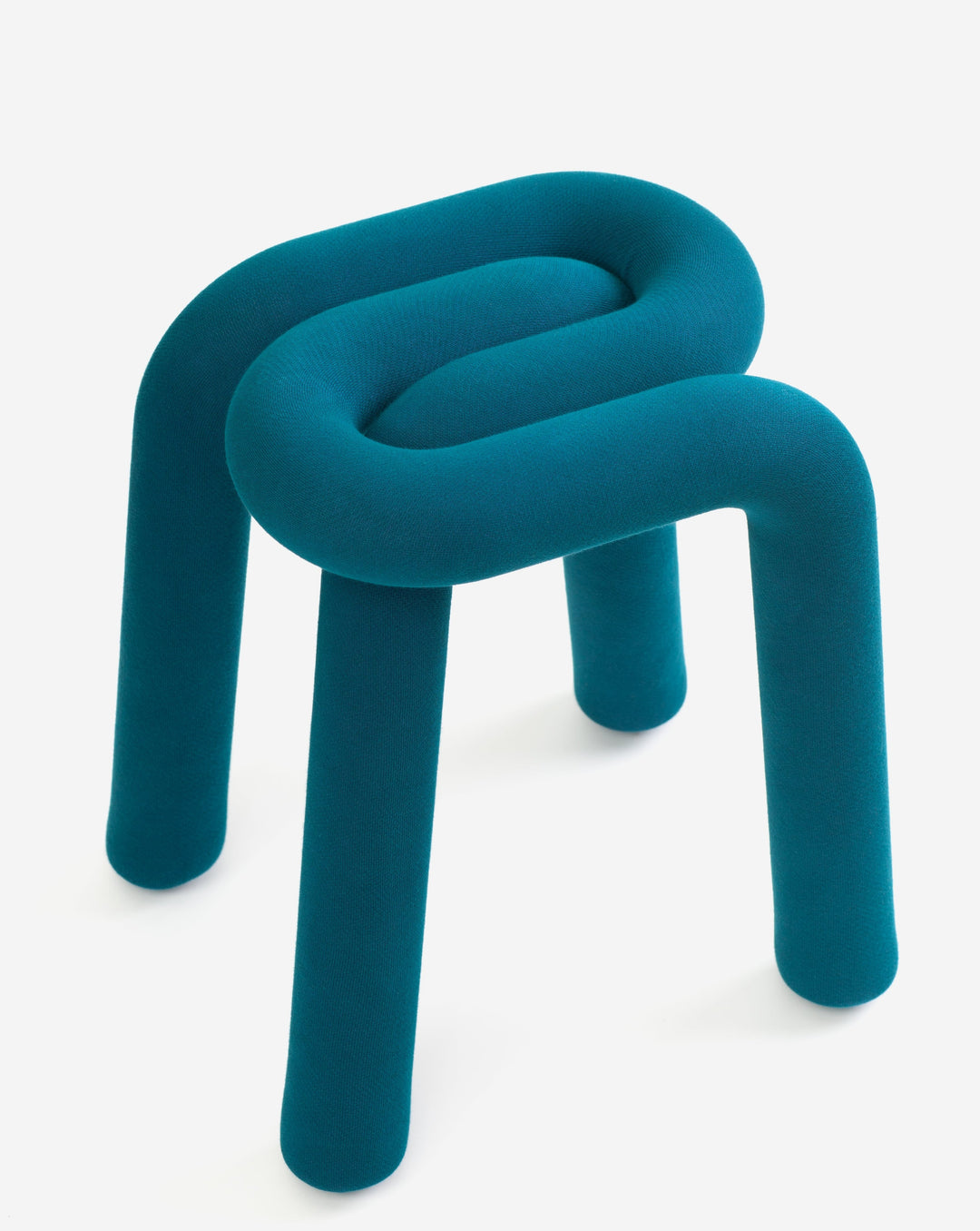 Teal fabric stool by Moustache, with a rounded, intertwined seat and three cylindrical legs.