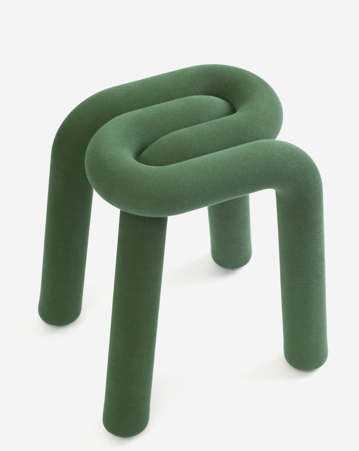 Green fabric stool by Moustache, made of cylindrical tubes bent to form seat and legs.