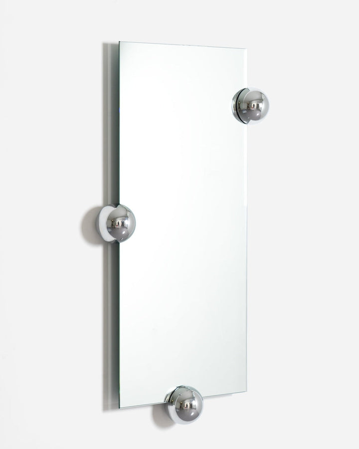 Rectangular wall mirror by Moustache Paris with chrome spherical accents.
