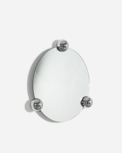 New from Moustache Editions, the Sphera collection of mirrors by Jean-Baptiste Fastrez is a contemporary interpretation of a technical device for creating mirror walls.  L. 69 cm x H. 71 cm x P. 10 cm  Material : Chrome-plated zamac, felt, silver mirror  Collection : Sphera  Made in France