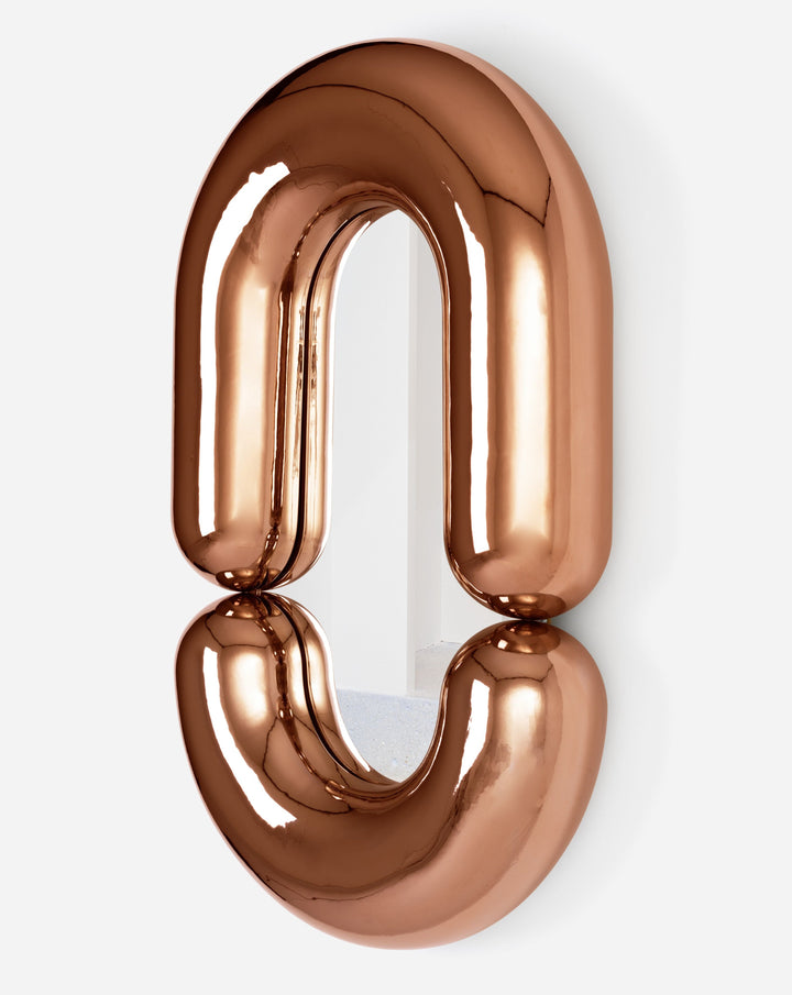 Copper finish mirror by Moustache Paris with a sculptural and rounded form.