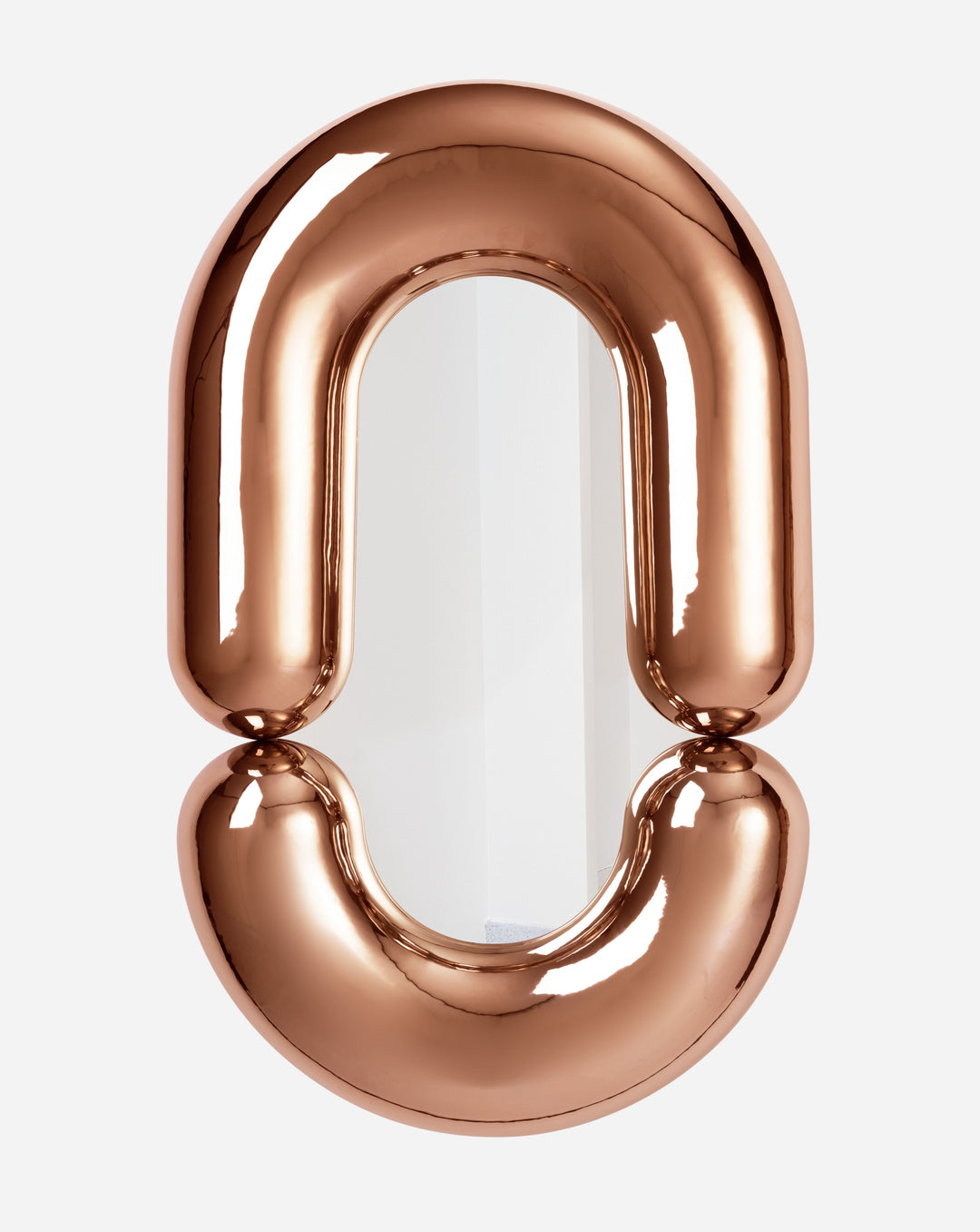 Copper finish mirror by Moustache Paris, featuring rounded rectangular design with glossy reflections against a white background.
