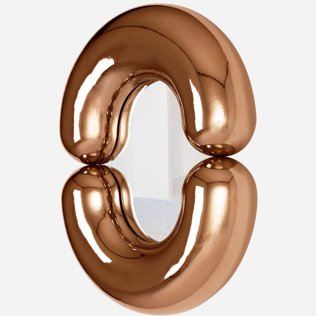 Copper Zodiac mirror by Moustache Paris with a circular frame and reflective surface.