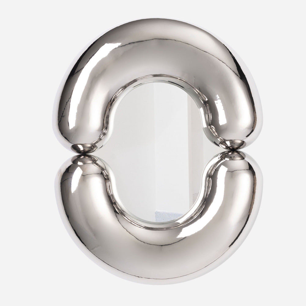 Platinum mirror by Moustache Paris with a plump, abstract, and reflective surface.