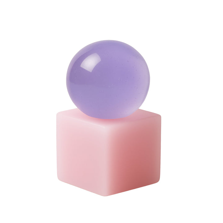 Purple soap on pink resin cube