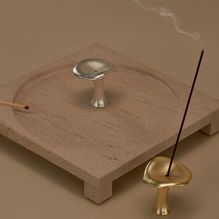 Silver and brass incense burners in a still life, available from Shop Dessein Parke