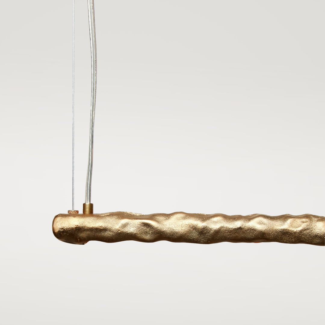 Brass linear ceiling light by Stem Design