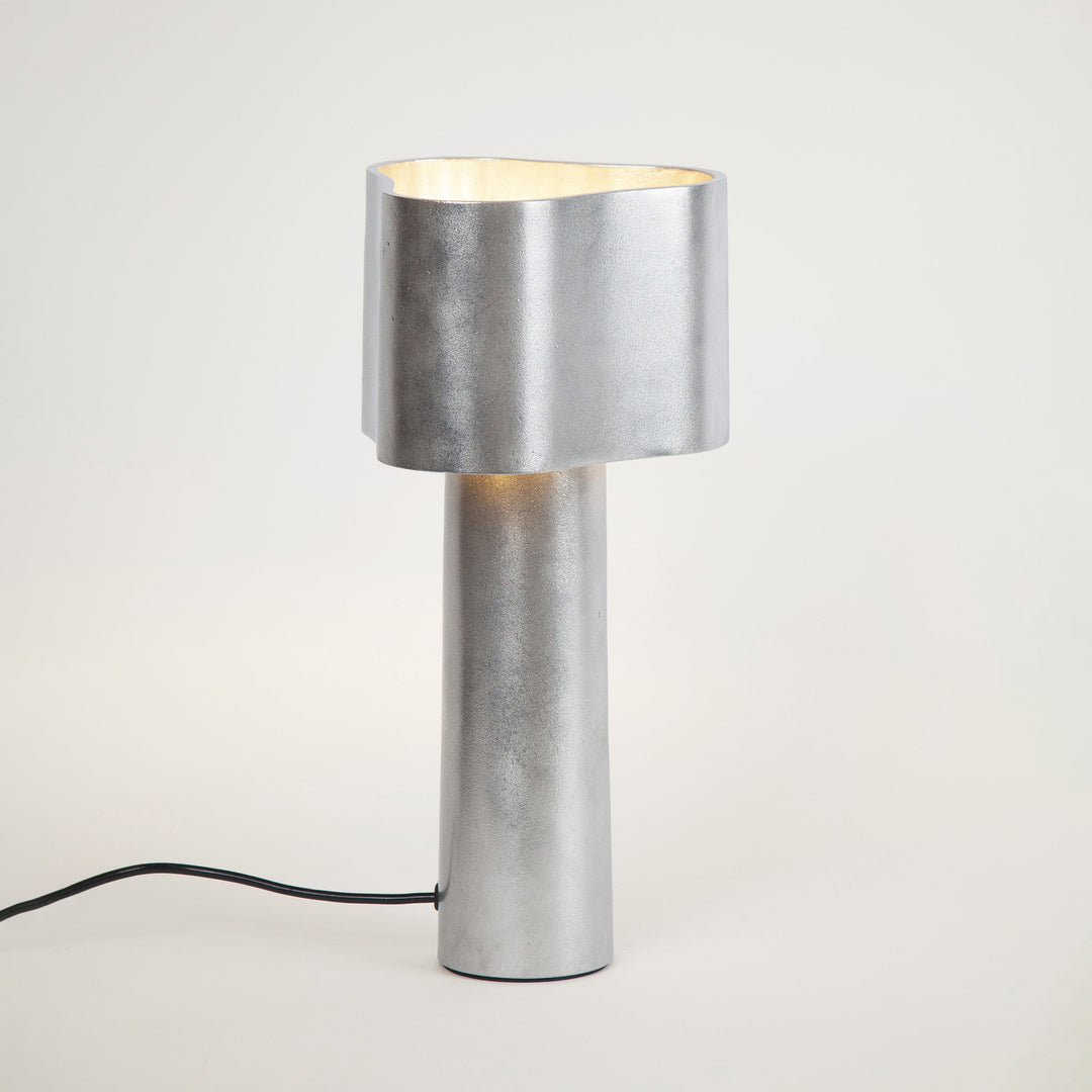 Silver table lamp on a white background