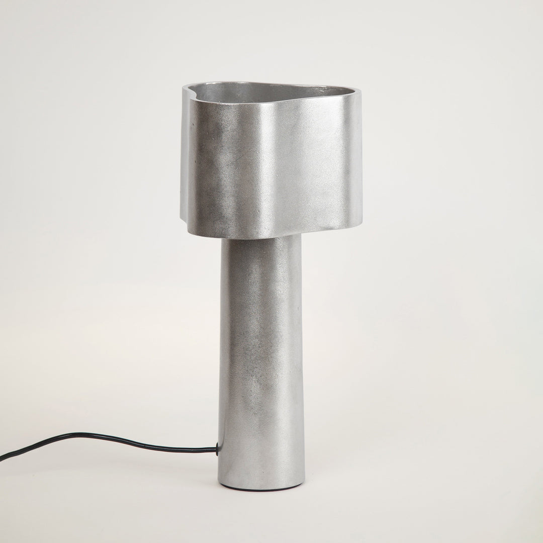 Stem Design Coy Silver table lamp on a white background light off
