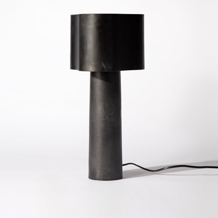 Black table lamp on a white background