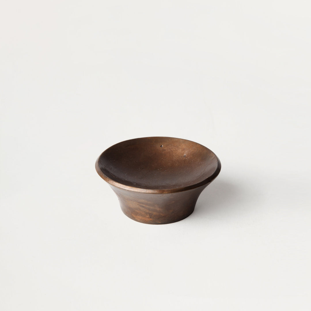 Luna paperweight in darkened brass from Stem