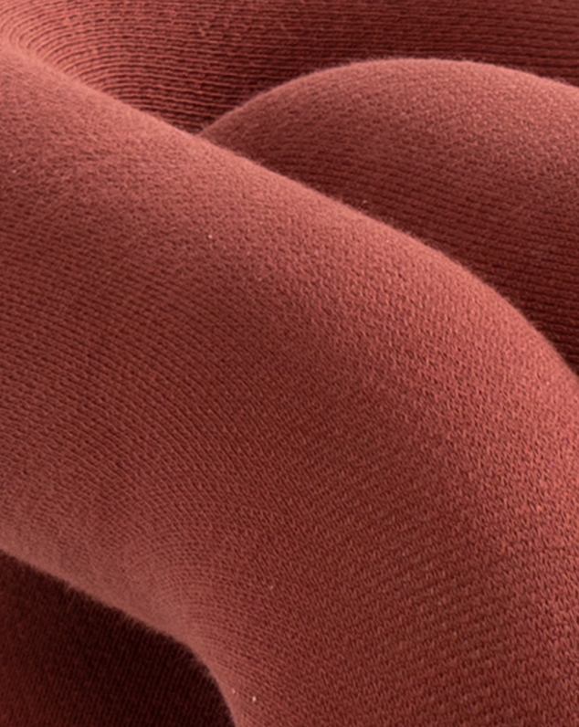 Purple stool with a soft texture, shown in a close-up crop.