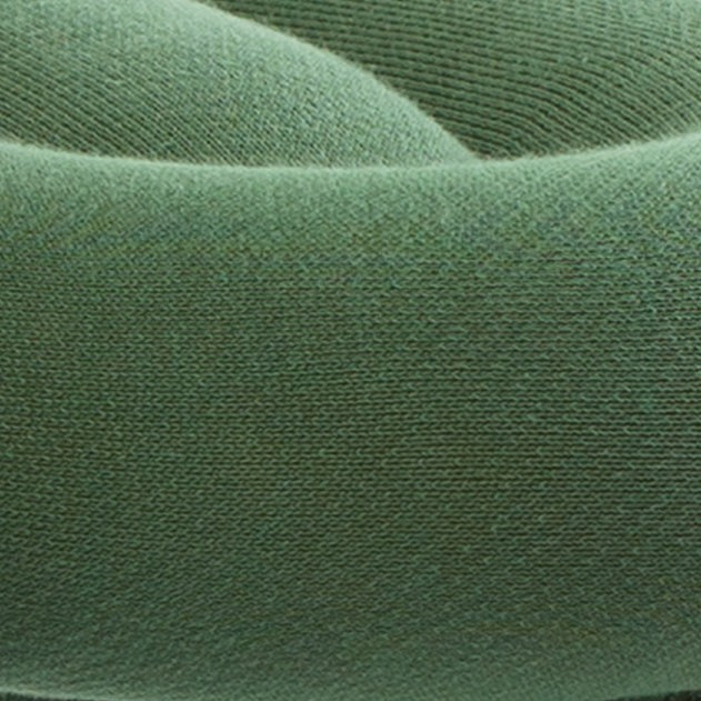 Forest green bench, by Moustache, featuring a bold form and knitted texture.