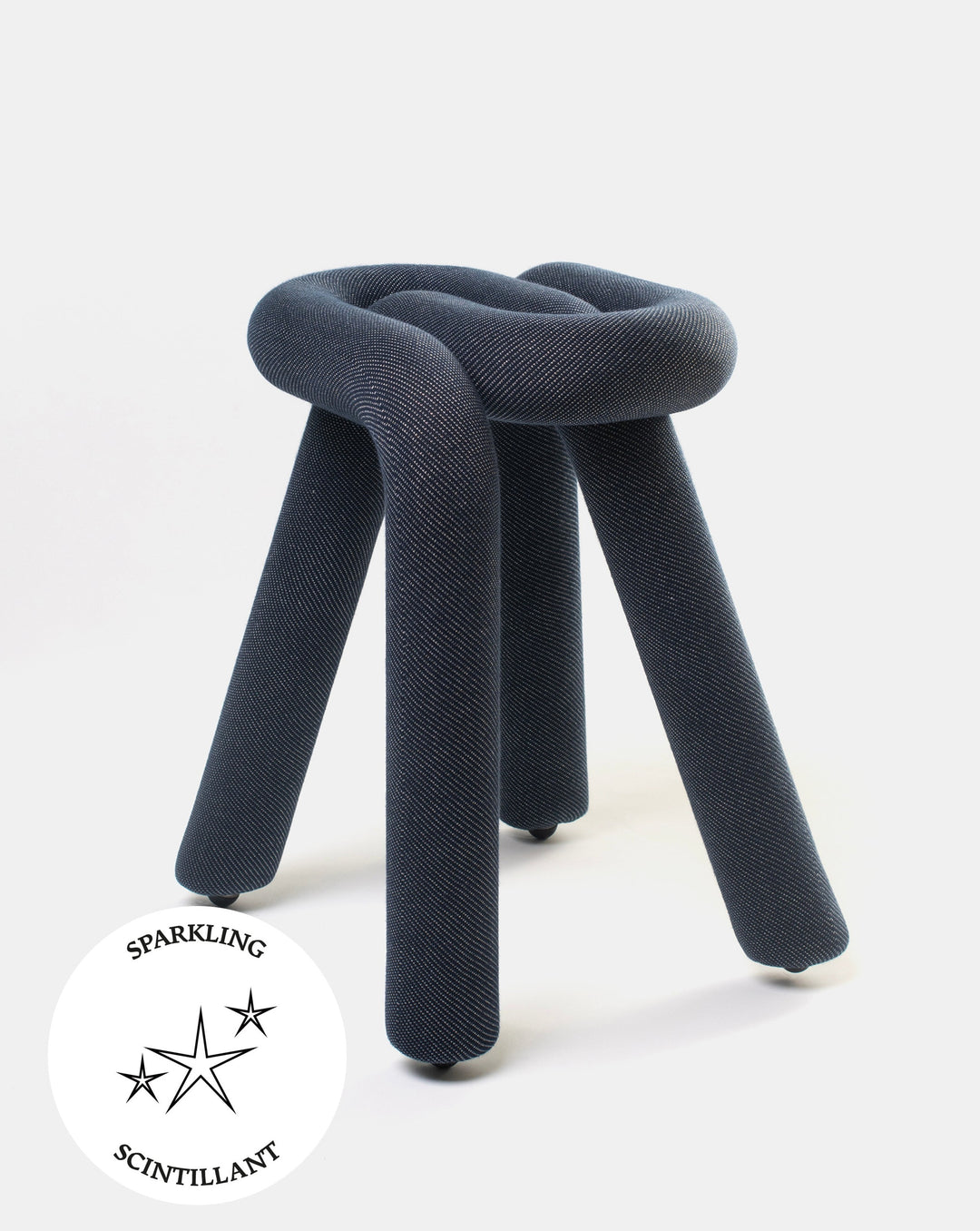 Purple Moustache Bold stool from Moustache, featuring a knotted design with a soft, textured finish.