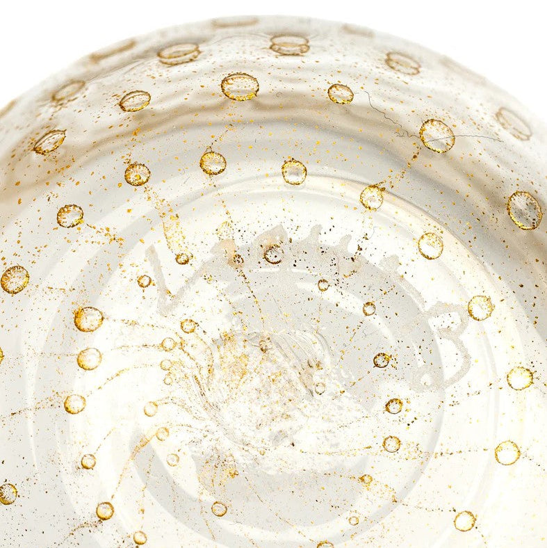 Crystal and gold "Bolle" tumbler by LAGUNA-B, featuring scattered golden dots and intricate internal detailing.
