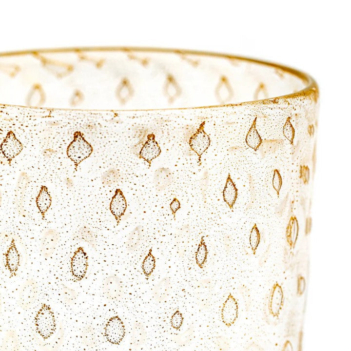 Crystal and gold tumbler by LAGUNA-B with teardrop pattern and speckled effect.