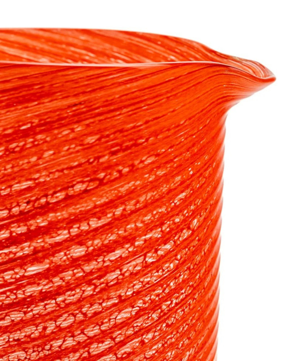 Coral glass jar by LAGUNA-B featuring a swirling pattern and fluted rim.