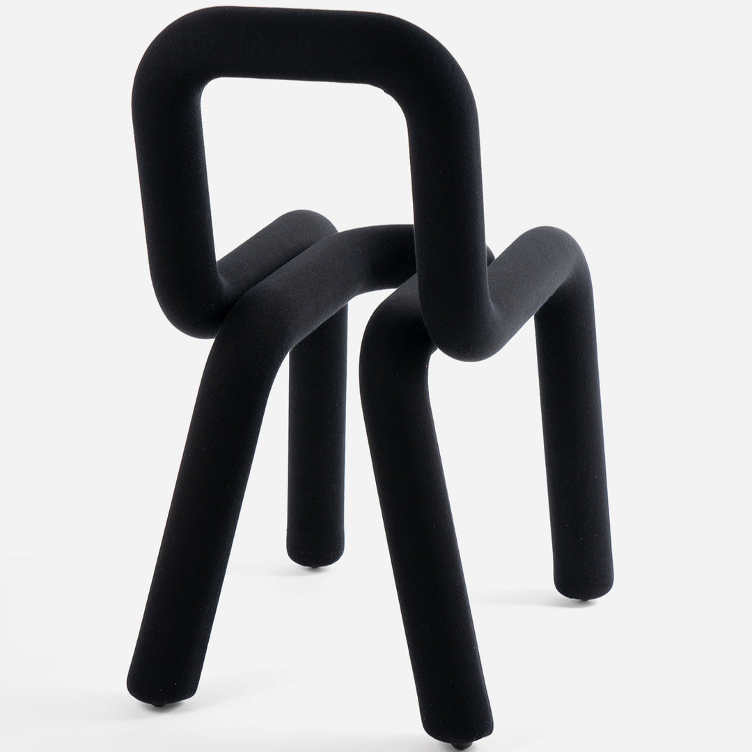 Black chair by Moustache Paris with a tubular design against a white background.