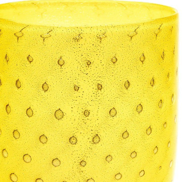 Yellow and gold tumbler by LAGUNA-B with bubble pattern and textured surface.